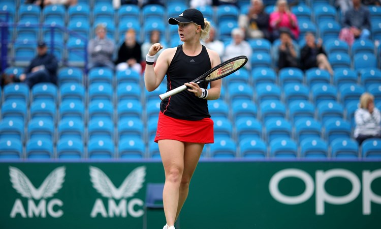 Fran Jones celebrating a point at the Eastbourne International