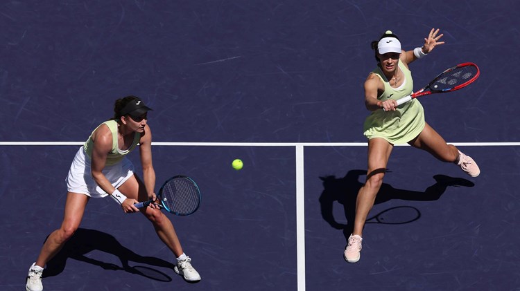 Olivia Nicholls and Tereza Mihalikova in action during the women's doubles final at Indian Wells