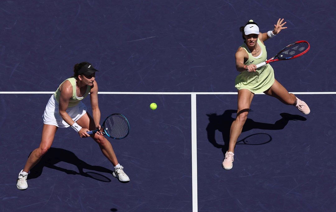 Olivia Nicholls and Tereza Mihalikova in action during the women's doubles final at Indian Wells
