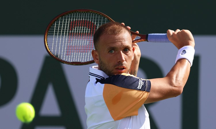 Dan Evans lines up a backhand at Indian Wells