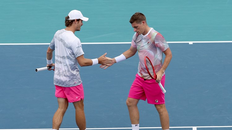 Neal Skupski and Wesley Koolhof high-five in the Miami Open semi-finals