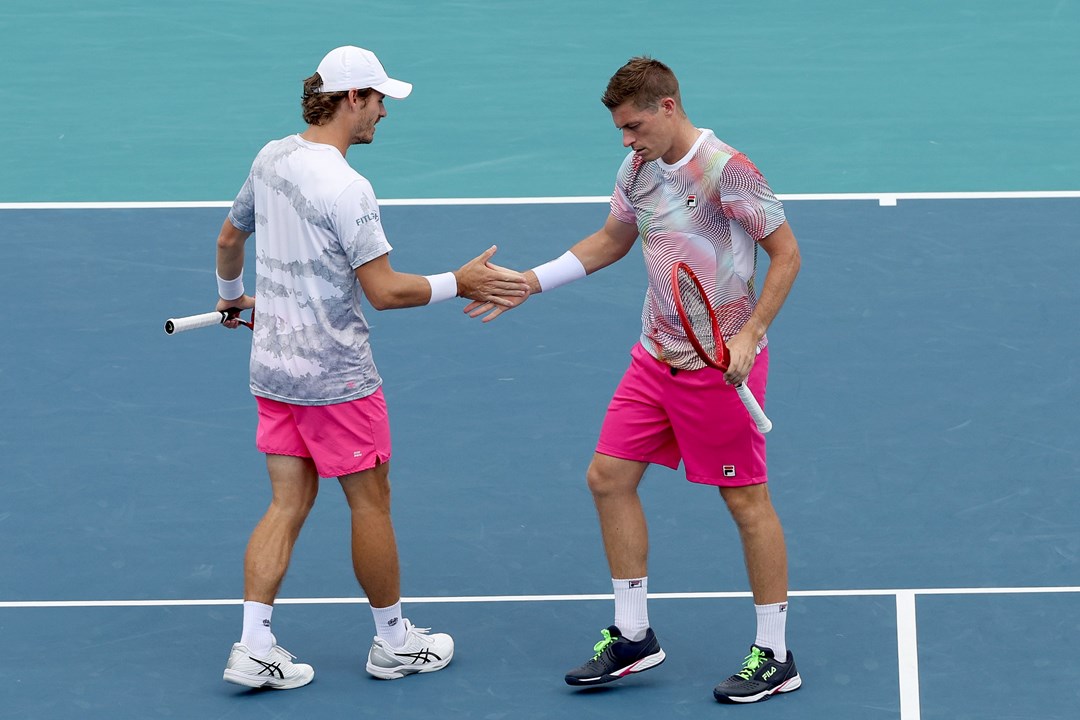 Neal Skupski and Wesley Koolhof high-five in the Miami Open semi-finals