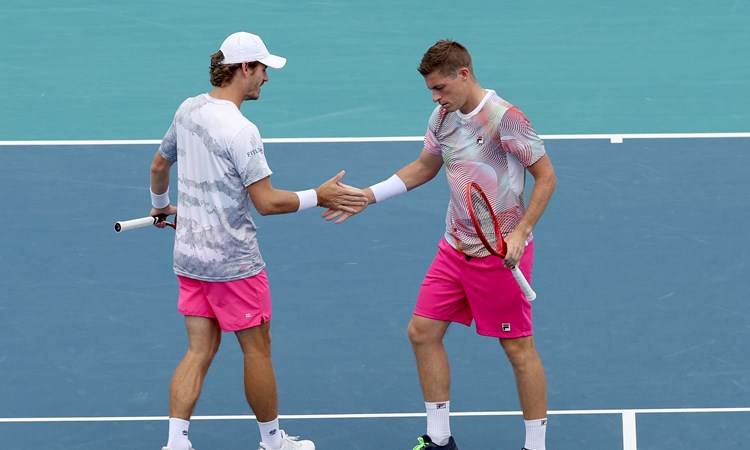 Neal Skupski and Wesley Koolhof high-five in the Miami Open semi-finals
