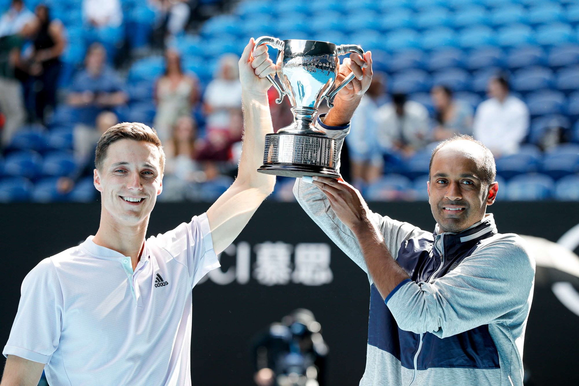 Joe Salisbury and Rajeev Ram lifting the 2021 US Open men's doubles title