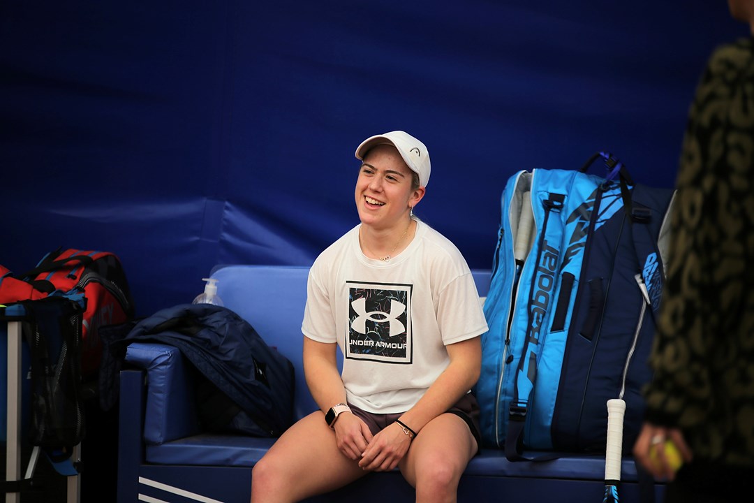 Sonay Kartal perching on a chair at the NTCduring her training for the Billie Jean King Cup 2022