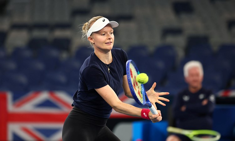 Harriet Dart hitting a volley on court at the Billie Jean King Cup qualifiers in Australia