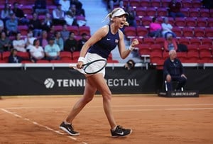 Katie Boulter lets out a roar in celebration as she beats Tatjana Maria at the Billie Jean King Cup