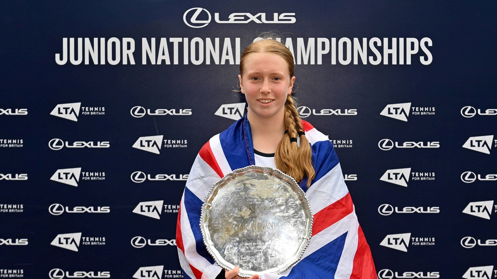 Daniella Britton holding the 2026 16U Lexus Junior National Championships title