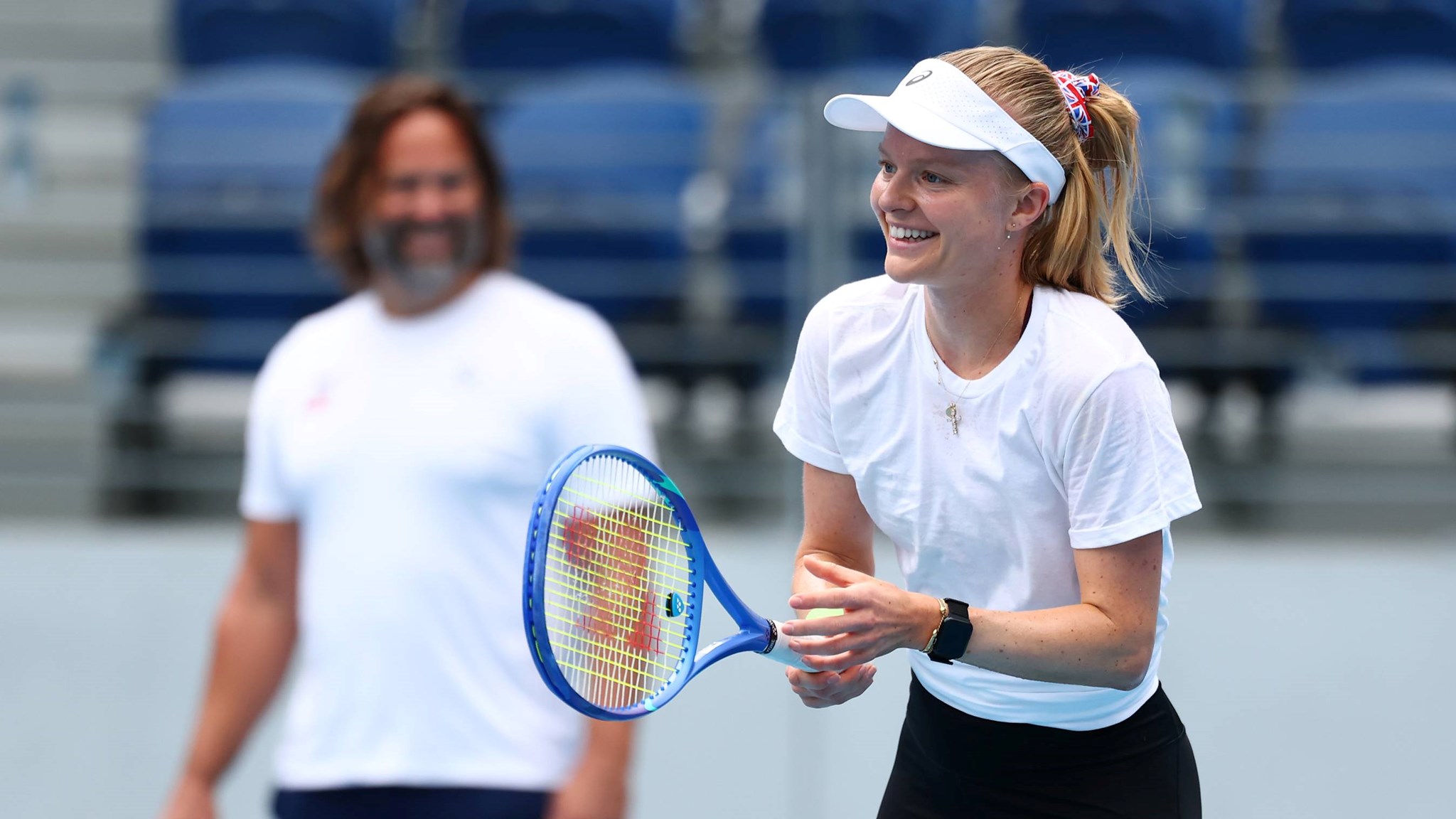 Harriet Dart laughing during practice at the Billie Jean King Cup