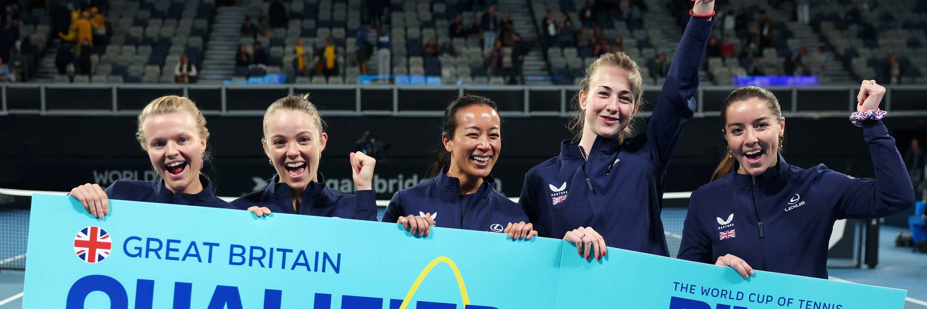 The GB Billie Jean King Cup team holding up the qualified sign after beating Australia