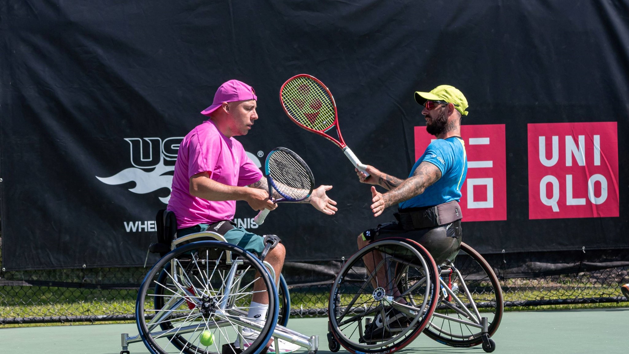 Andy Lapthorne and Heath Davidson high five at the Cajun Classic