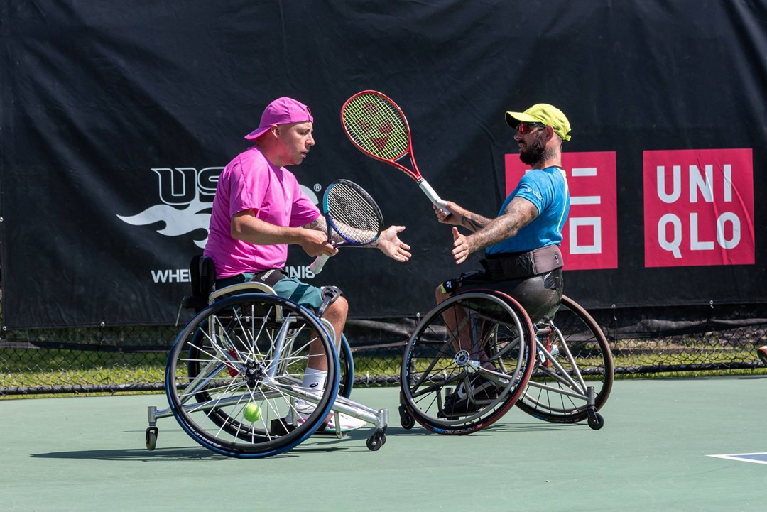 Andy Lapthorne and Heath Davidson high five at the Cajun Classic