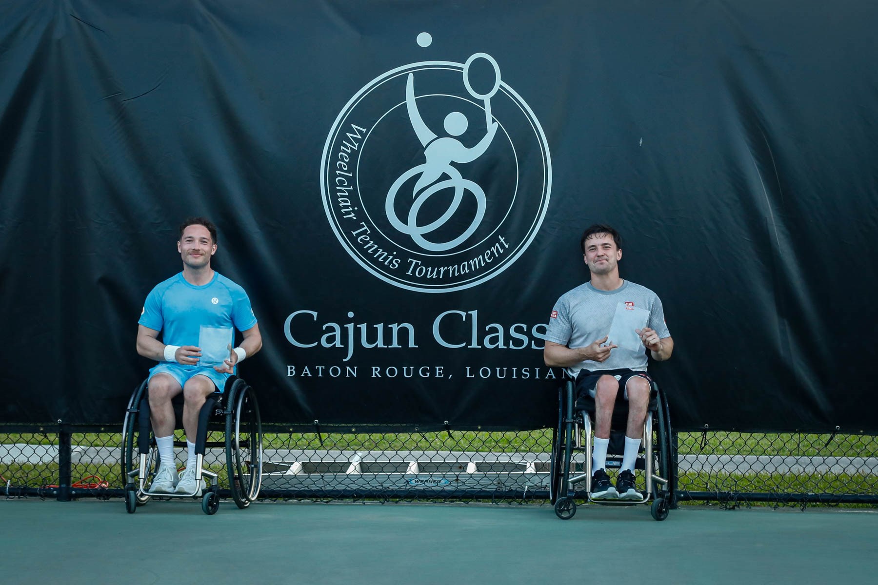 Alfie Hewett and Gordon Reid holding trophies at the Cajun Classic