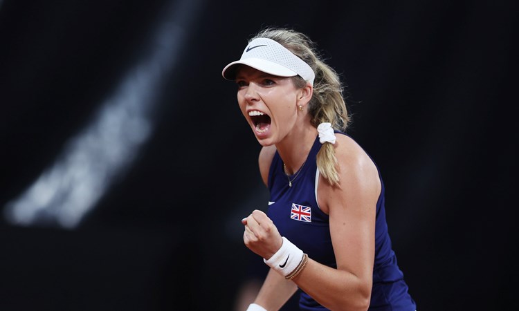 Katie Boulter roaring in celebration on court at the Billie Jean King Cup