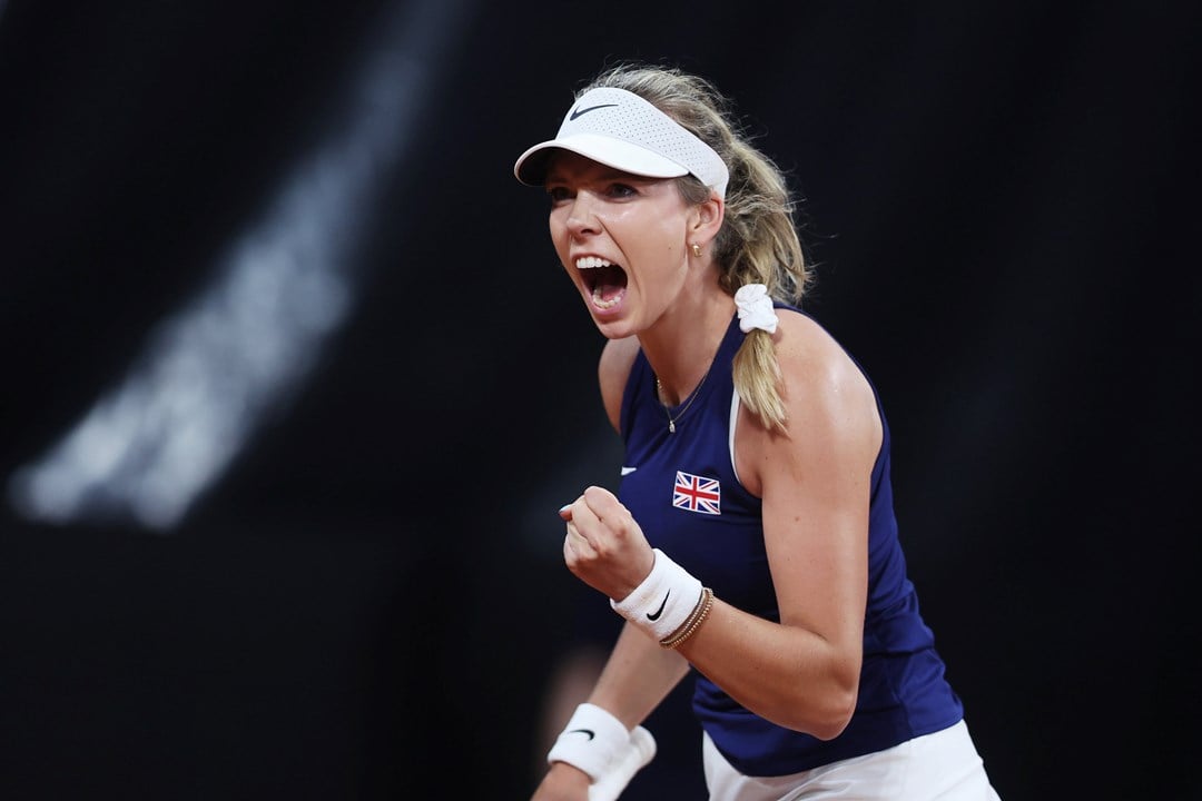 Katie Boulter roaring in celebration on court at the Billie Jean King Cup