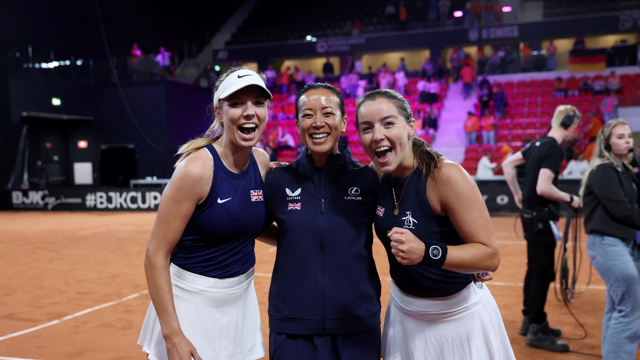 Katie Boulter, Anne Keothavong and Jodie Burrage all smiling after GB defeated Netherlands at the Billie Jean King Cup