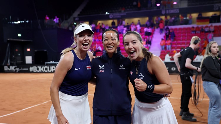 Katie Boulter, Anne Keothavong and Jodie Burrage all smiling after GB defeated Netherlands at the Billie Jean King Cup