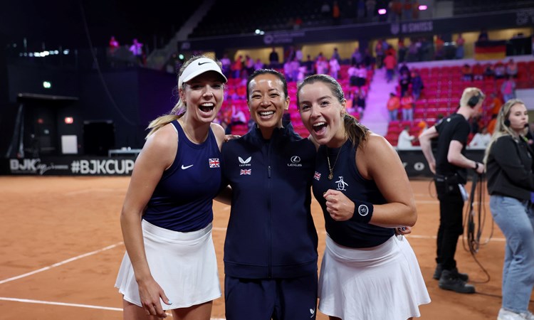 Katie Boulter, Anne Keothavong and Jodie Burrage all smiling after GB defeated Netherlands at the Billie Jean King Cup