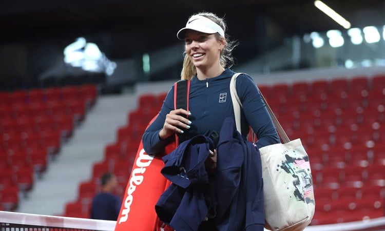 Katie Boulter walking on court for practice at the Billie Jean King Cup in The Hague