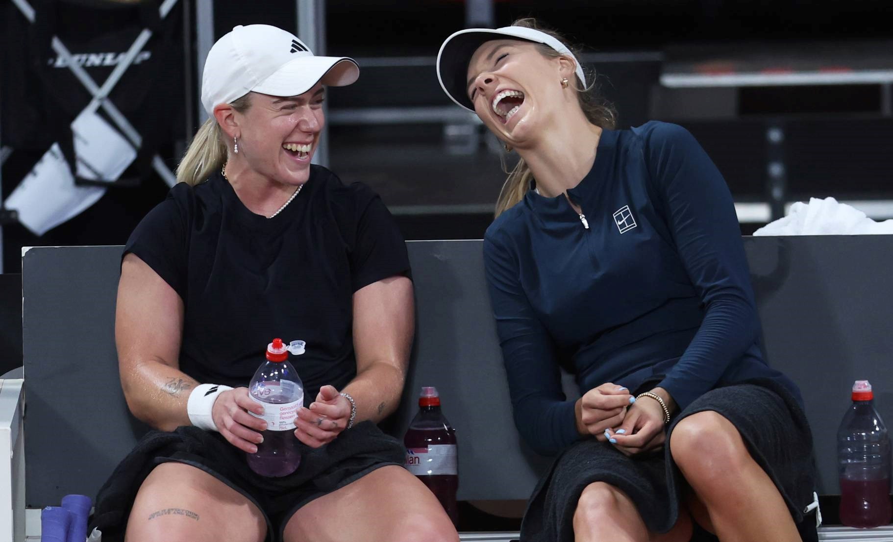 Sonay Kartal and Katie Boulter laughing together during Billie Jean King Cup practice