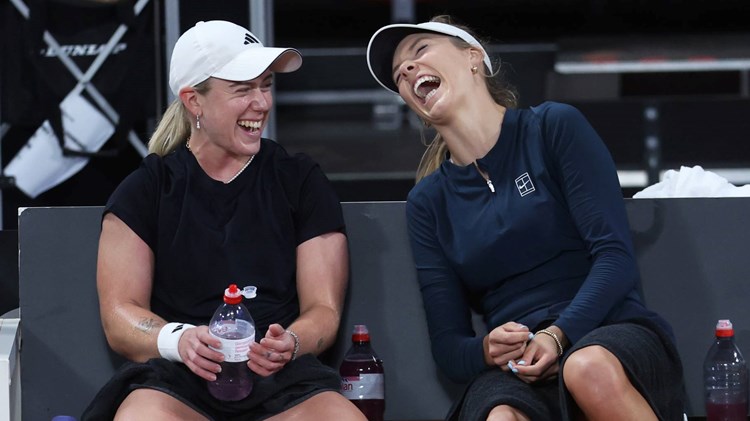 Sonay Kartal and Katie Boulter laughing together during Billie Jean King Cup practice
