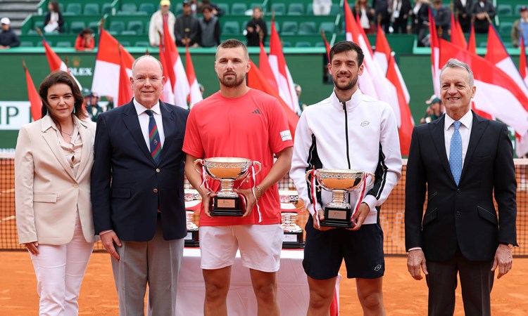Lloyd Glasspool and Julian Cash holding the runners-up trophies at the Rolex Monte-Carlo Masters