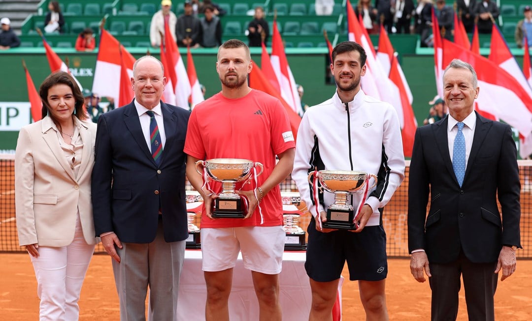 Lloyd Glasspool and Julian Cash holding the runners-up trophies at the Rolex Monte-Carlo Masters