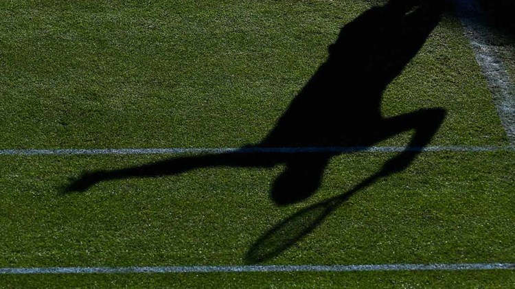 player shadow on grass court