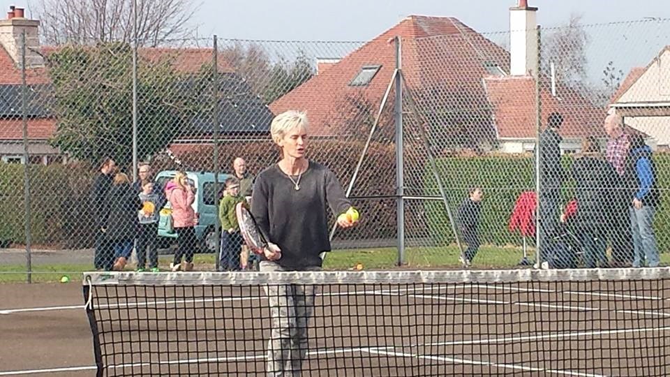 Judy Murray leading the way on court with racket and tennis balls to hand at Longniddry Tennis Club