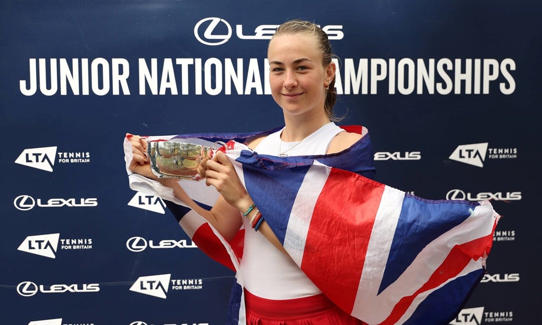 Mika Stojsavljevic holding the 2025 18U Lexus Junior National Championships title