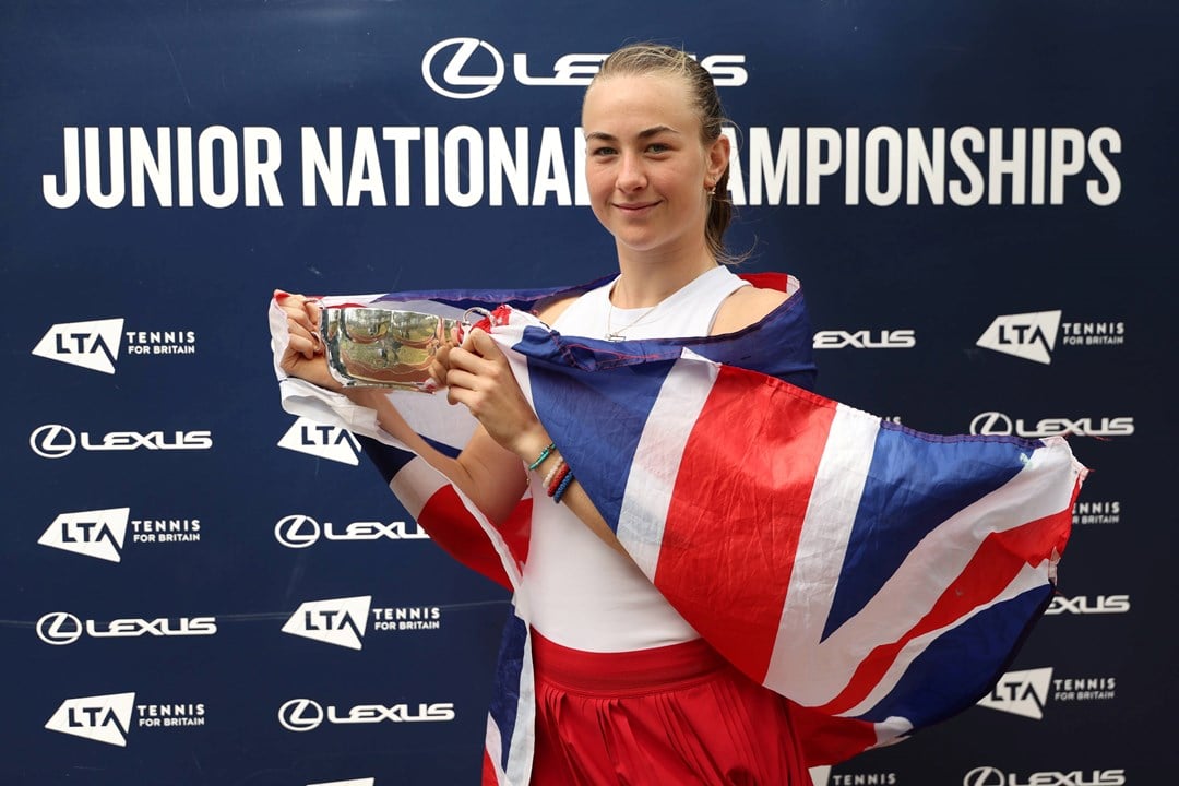 Mika Stojsavljevic holding the 2025 18U Lexus Junior National Championships title