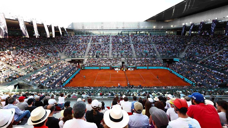 Centre Court at the Mutua Madrid Open, with a crowd looking on to the court