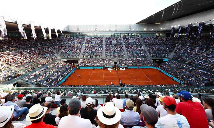 Centre Court at the Mutua Madrid Open, with a crowd looking on to the court