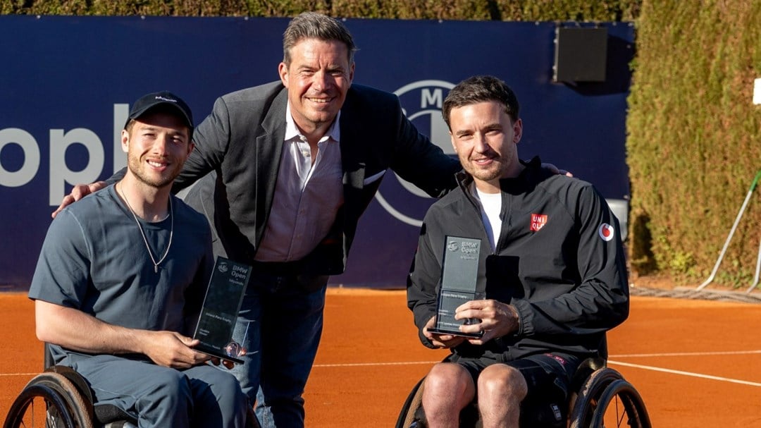 Alfie Hewett and Gordon Reid holding the ITF1S Munich men's doubles title