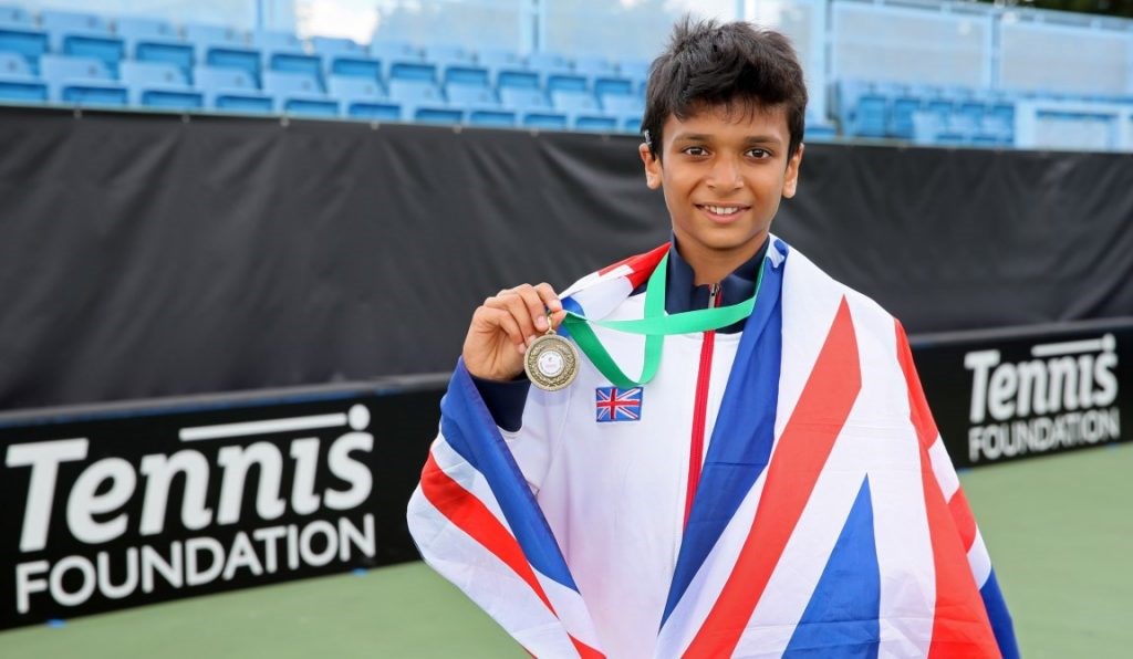Esah Hayat posing with his gold medal at the Boys World Deaf Tennis Championships 2015