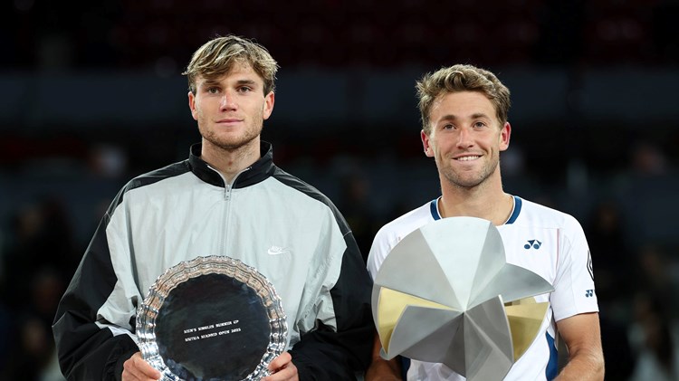 Jack Draper and Casper Ruud holding their Mutua Madrid Open trophies after Ruud beat Draper 7-5, 3-6, 6-4 in the final