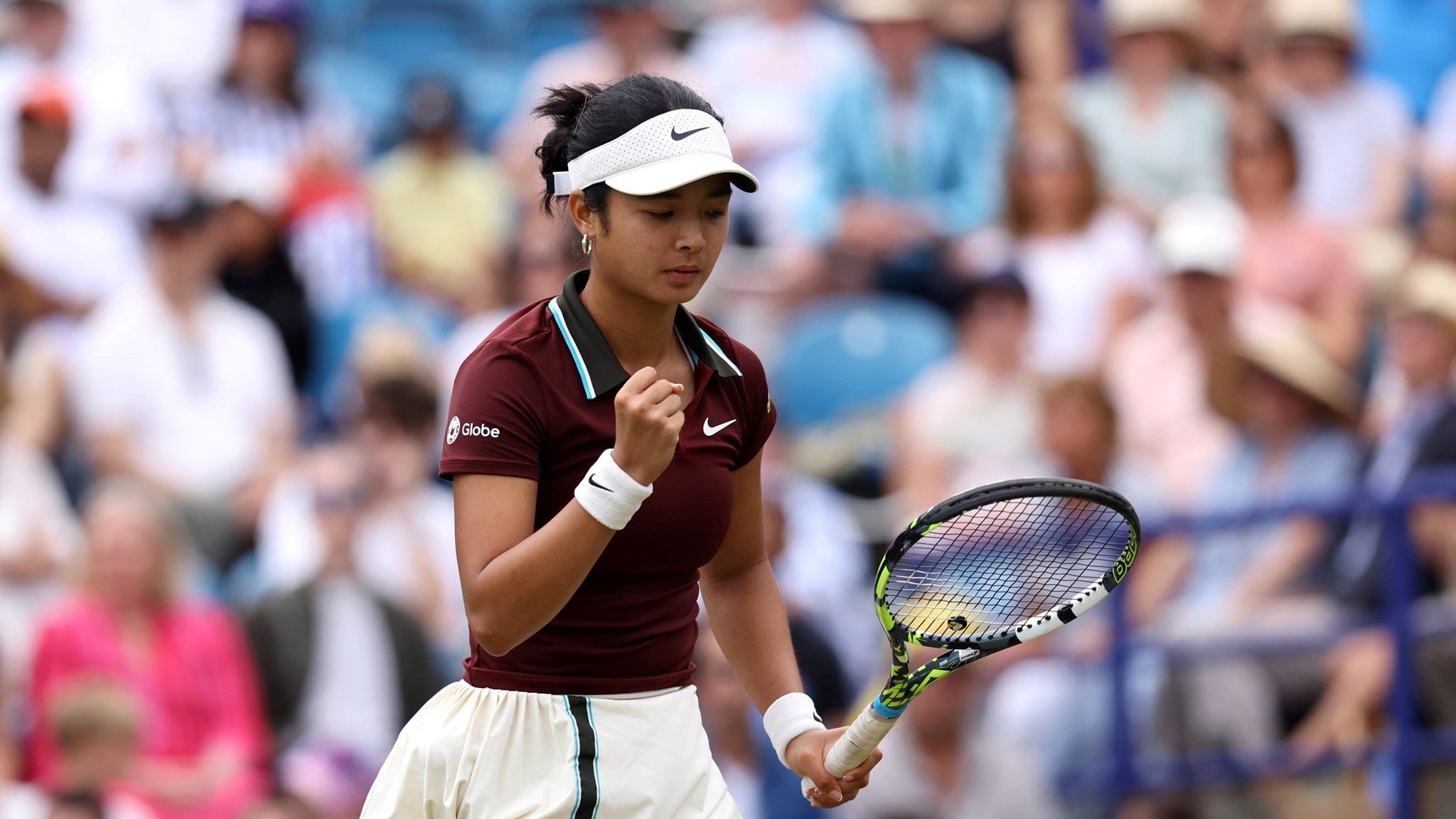 Alex Eala celebrates winning a point at the 2025 Lexus Eastbourne Open