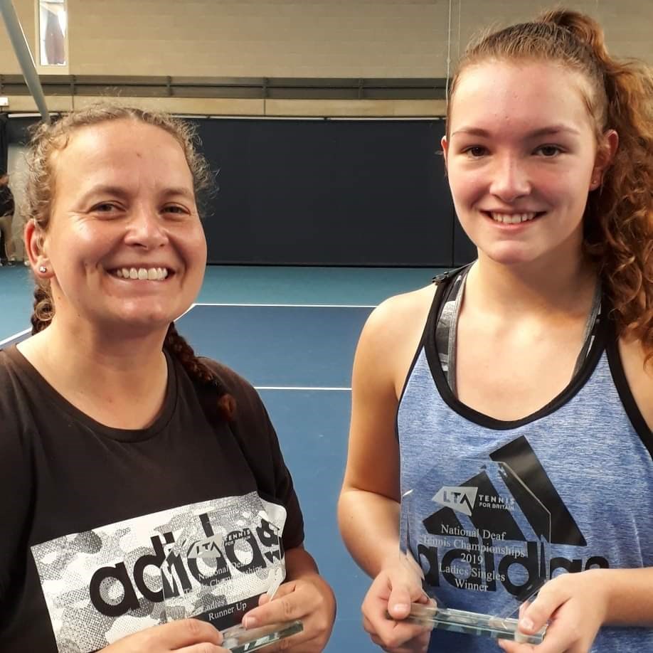 Phoebe Suthers posing with the trophy after winning the National Deaf Tennis Championships 2019