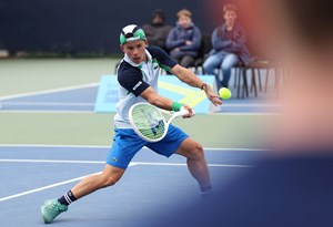 Ben Gusic Wan hitting a volley at the 2025 Lexus Junior National Championships at the National Tennis Centre