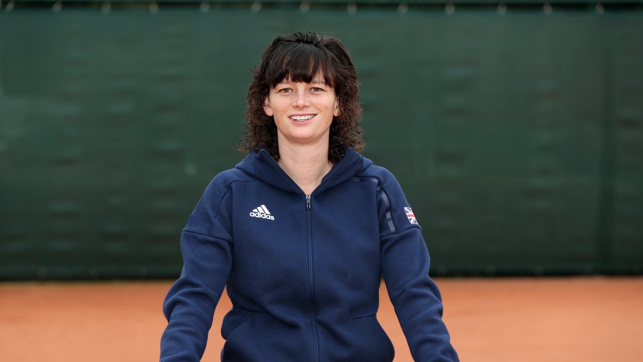Catherine Fletcher posing for a picture wearing the GB kit before the World Deaf Tennis Championships