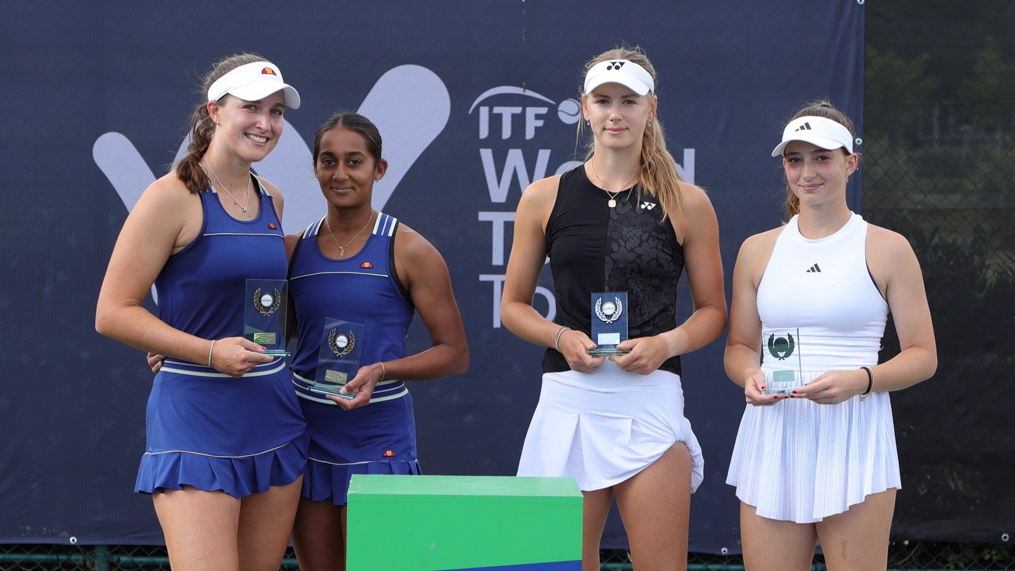 Naiktha Bains and Holly Hutchinson holding their winners trophies at the Lexus Pro Series Nottingham while stood next to runners-up Brooke Black and Daniela Piani