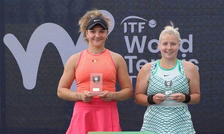 British tennis player Amarni Banks holding her winners trophy at the Lexus Pro Series Nottingham alongside runner-up  Alice Gillan 