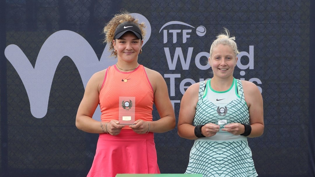 British tennis player Amarni Banks holding her winners trophy at the Lexus Pro Series Nottingham alongside runner-up Alice Gillan