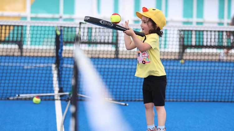 A young player discovering padel for the very first time at last year’s Lexus Nottingham Open Family Fun Weekend 