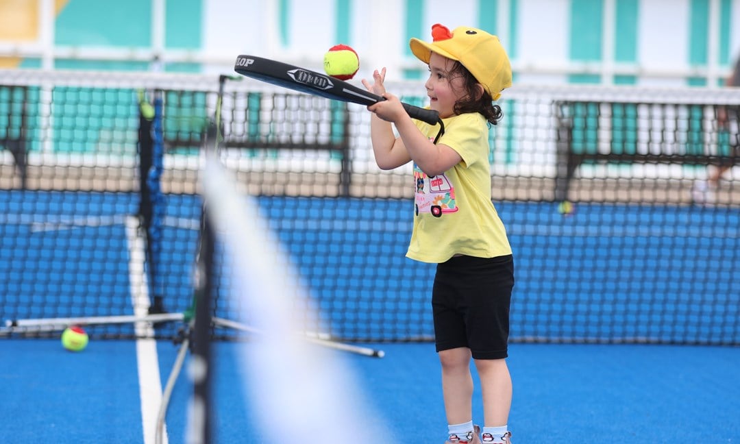 A young player discovering padel for the very first time at last year’s Lexus Nottingham Open Family Fun Weekend 