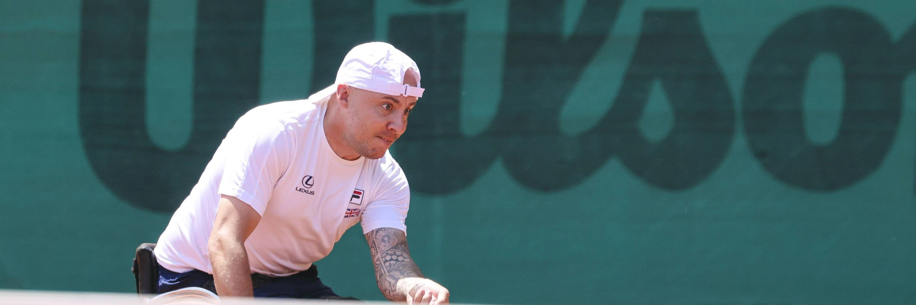 Andy Lapthorne reaches for a forehand for Great Britain at the 2025 World Team Cup