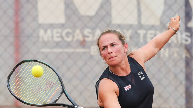 Lucy Shuker reaches for a volley playing for GB at the World Team Cup 2024