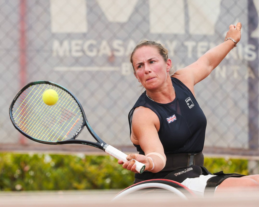 Lucy Shuker reaches for a volley playing for GB at the World Team Cup 2024
