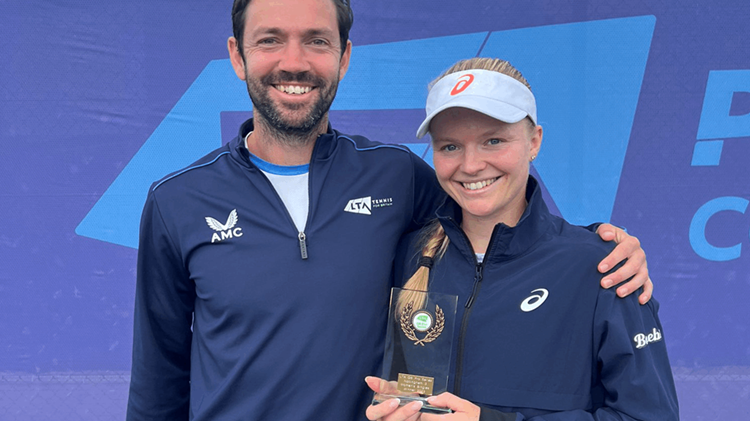 Harriet Dart holding her winners trophy at the W25 Nottingham event