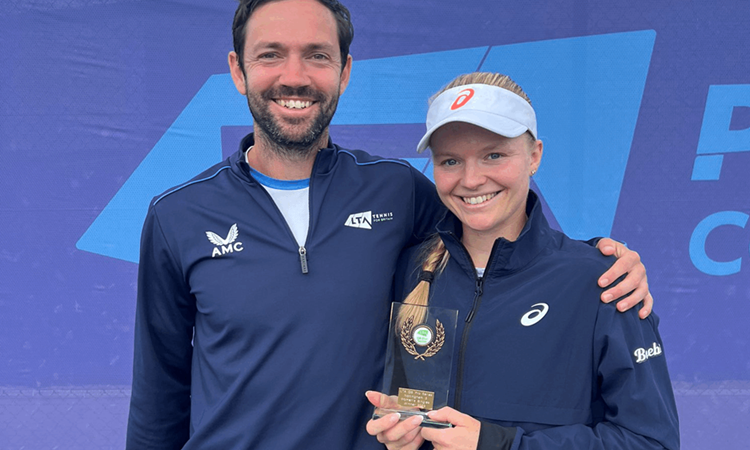 Harriet Dart holding her winners trophy at the W25 Nottingham event